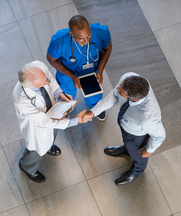 MSL shaking hands with physician