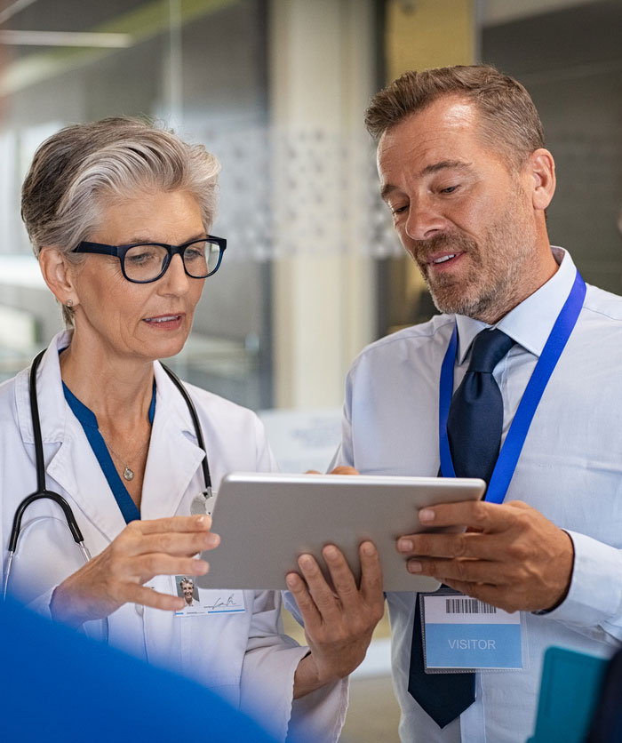 CTL and physician holding tablet